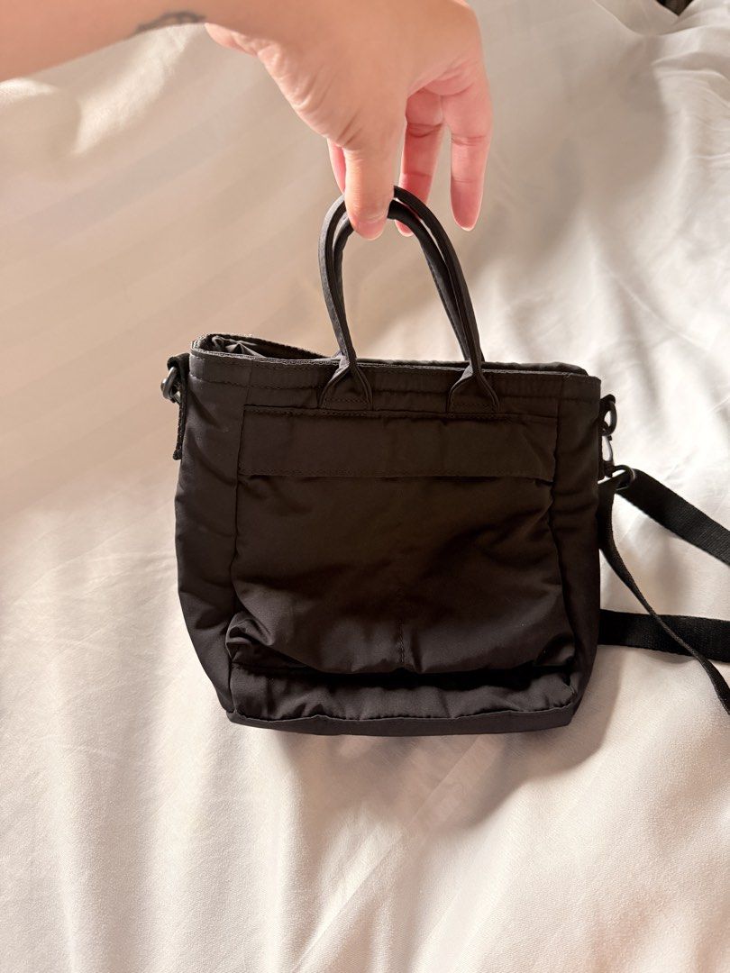 Uniqlo 2 way ulitily mini bag (Category: Cross-body Bags) located in Quezon City. Submitted by glittermoongirl (Listing ID 1460124759, Image 2). Description: Once used only! Location: Marikina.