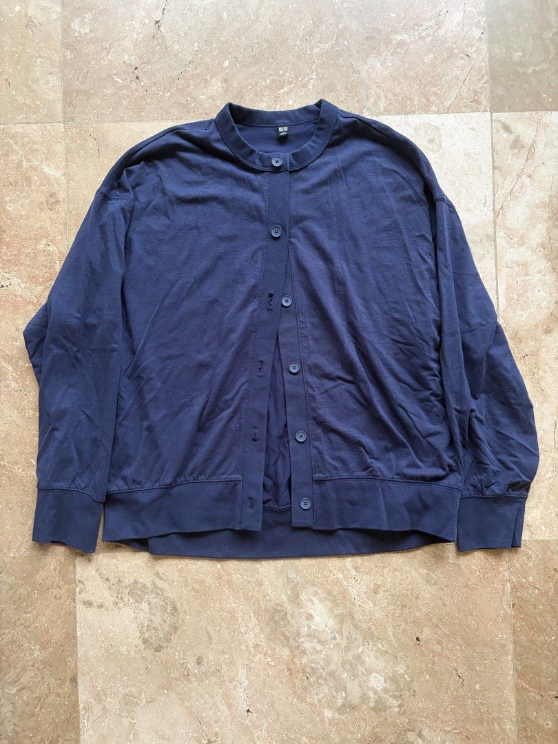 Uniqlo Navy Button Cardigan (Category: Coats, Jackets and Outerwear) located in Quezon City. Submitted by tidyup.lara (Listing ID 1460124347, Image 1). Description: Size L Bust 40”+ Waist 40”+ Length 26” Condition 8/10: used but in good condition .
