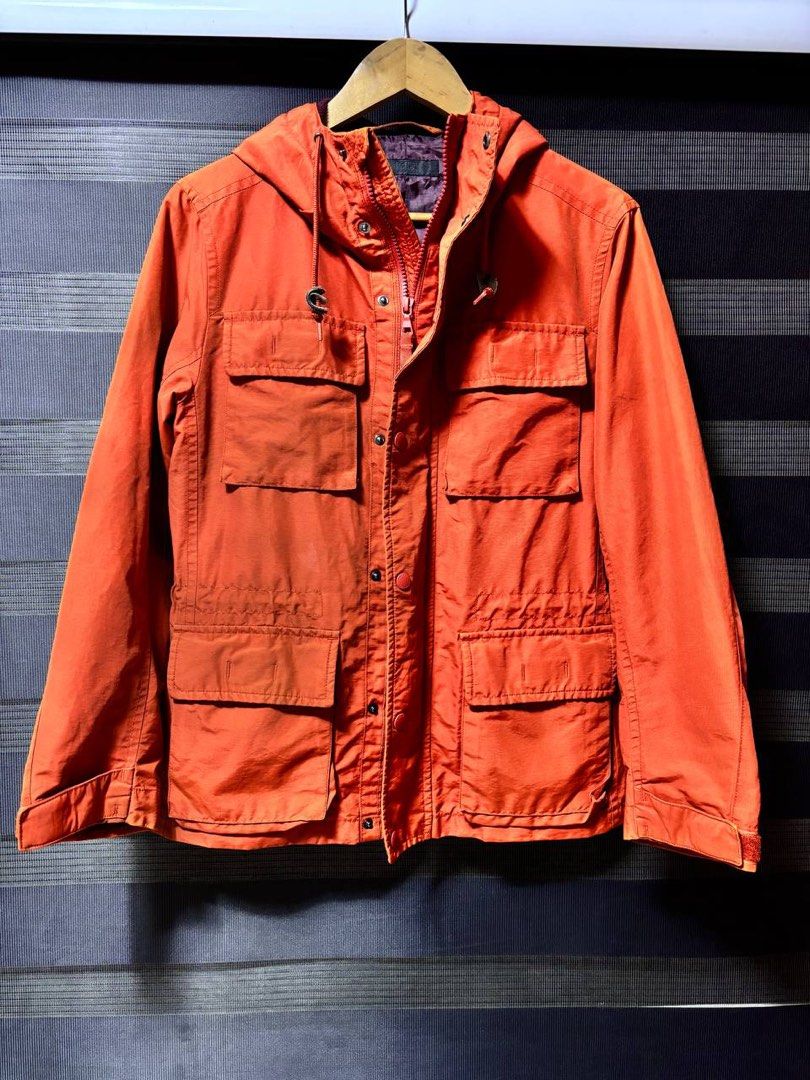 Uniqlo Parka Hooded Utility Jacket with Multiple Pockets (Category: Coats, Jackets and Outerwear) located in Pasig City. Submitted by abogadosupremo (Listing ID 1460143791, Image 2). Description: - Uniqlo Mountain Parka orange utility jacket - Features a hood - Multiple pockets on the front - Zipper and button closure - Ideal for casual wear or outdoor activities - SRP : 4,500 - Pairs well with jeans or chinos - 100% Legit and Authentic - Very Go