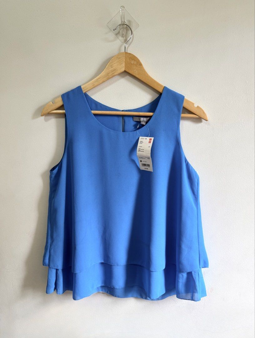 Uniqlo top (Category: Blouses) located in Tarlac. Submitted by giannisdeclutters4106 (Listing ID 1460159380, Image 1). Description: Brand new with tag Medium.