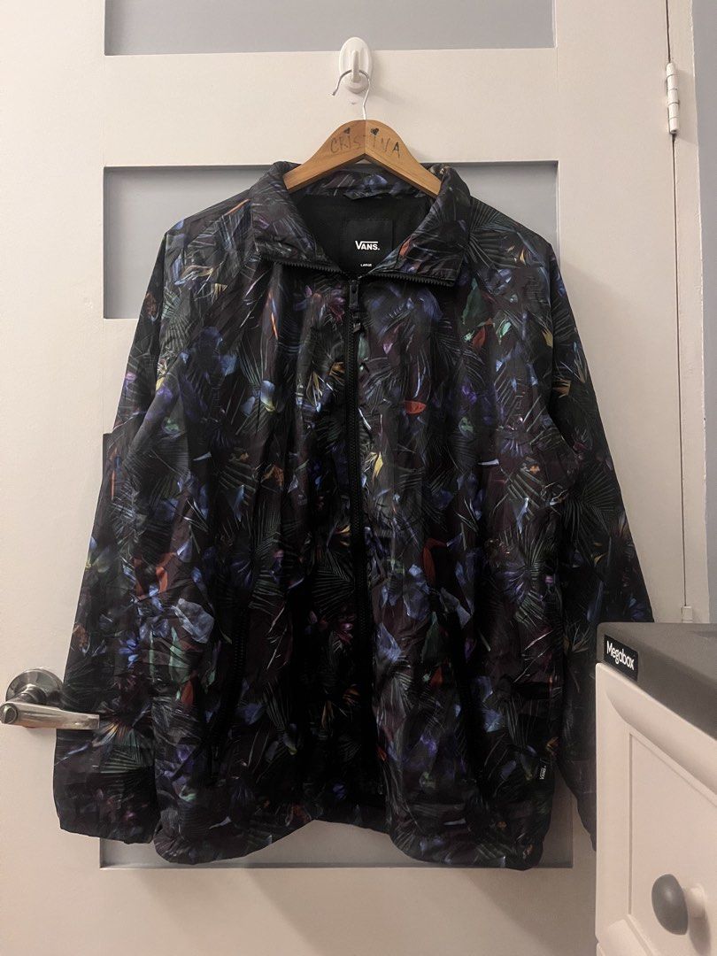 Vans Jacket Large Tropical Print Windbreaker (Category: Coats, Jackets and Outerwear) located in Calasiao. Submitted by cristinabarongan5 (Listing ID 1460190209, Image 1). Description: - Vans Jacket - Size: Large - Style: Windbreaker - Design: All-over tropical leaf print - Features: Full zip front, lightweight material - Perfect for: Casual wear, layering - Dimension 22 x 29 .