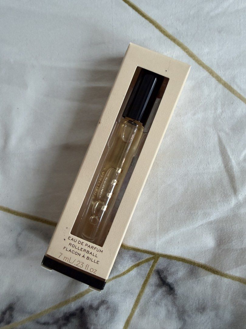 Victoria's Secret Eau de Parfum Rollerball 7ml (Category: Fragrance & Deodorants) located in Mandaluyong City. Submitted by xthinejavier (Listing ID 1460197296, Image 1). Description: - Victoria's Secret Rollerball Perfume - Eau de Parfum - 7ml size - Ideal for travel or keeping in your bag - Convenient for on-the-go application Never been used only opened package to smell the perfume. I dont generally like gourmand scents if you love vanila pefu