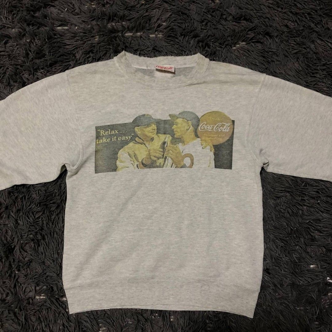Vintage Coca-Cola Sweatshirt (Category: Activewear) located in Camiling. Submitted by thriftscape2024 (Listing ID 1460191312, Image 1). Description: Excellent Condition Color rate: 9/10 Issue: distressed Dimes: W20xL26.