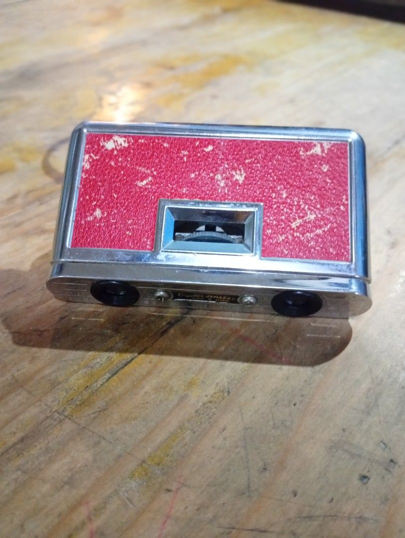 Vintage Crystal Opera Glasses / Theater Binocular (Category: Vintage Collectibles) located in San Mateo. Submitted by waynetek14 (Listing ID 1460207293, Image 2). Description: Compact opera glasses. Silver metal body with red textured accents. Lenses are clear. Made in Japan by Crystal. Great for concerts or theater. Folds up small for easy carrying. A classic accessory..