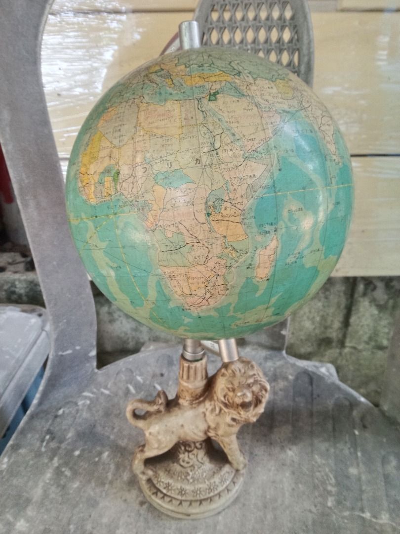 Vintage Globe with Lion Stand (Category: Vintage Collectibles) located in Bulacan. Submitted by vhienice1130 (Listing ID 1460254158, Image 2). Description: - Unique vintage globe with a detailed lion base. - Displays continents and oceans. - Globe spins on its axis. - Perfect decorative piece for a study or display area. - Approximate height: [insert height here]..