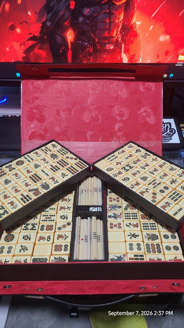Vintage Mahjong Set with Case (Category: Board Games & Puzzles) located in Cabuyao City. Submitted by daniel.clyde86 (Listing ID 1460182513, Image 1). Description: - Complete Mahjong set - Red and black carrying case with handle - Includes all tiles with Chinese characters and images - Comes with dice - Ideal for game nights - Sold as is.