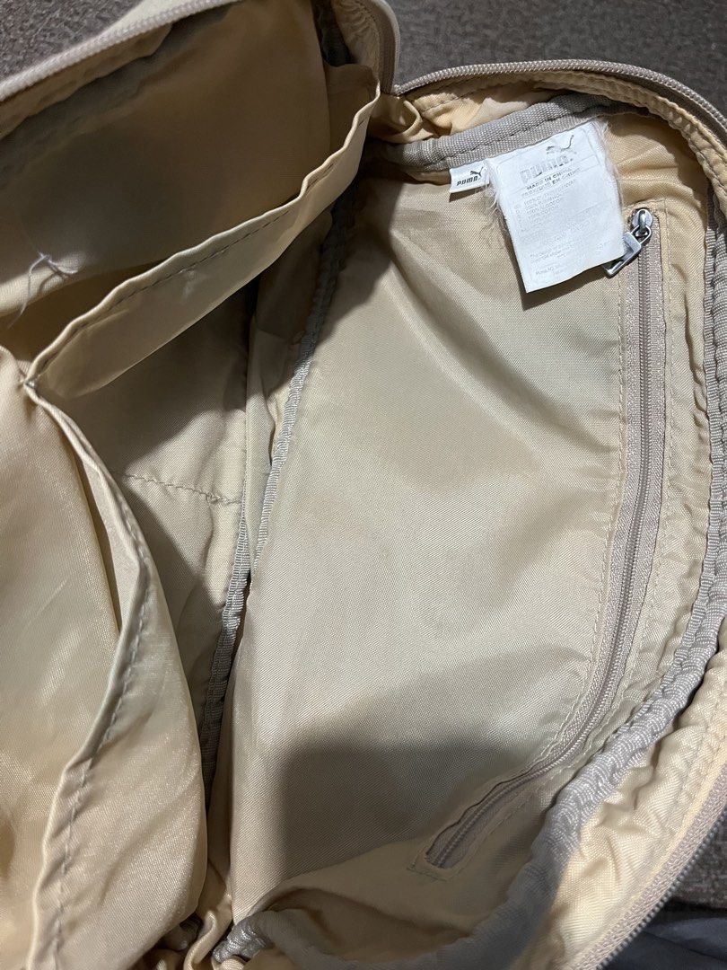 Vintage PUMA Shoulder Bag (Category: Shoulder Bags) located in Taguig. Submitted by ryv0.o (Listing ID 1460283945, Image 3). Description: Vintage PUMA Shoulder Bag - Spacious interior with a zippered compartment - Double top handles with metal hardware - Great for everyday or casual use MOD: Lalamove/J&T MOP: GCash.