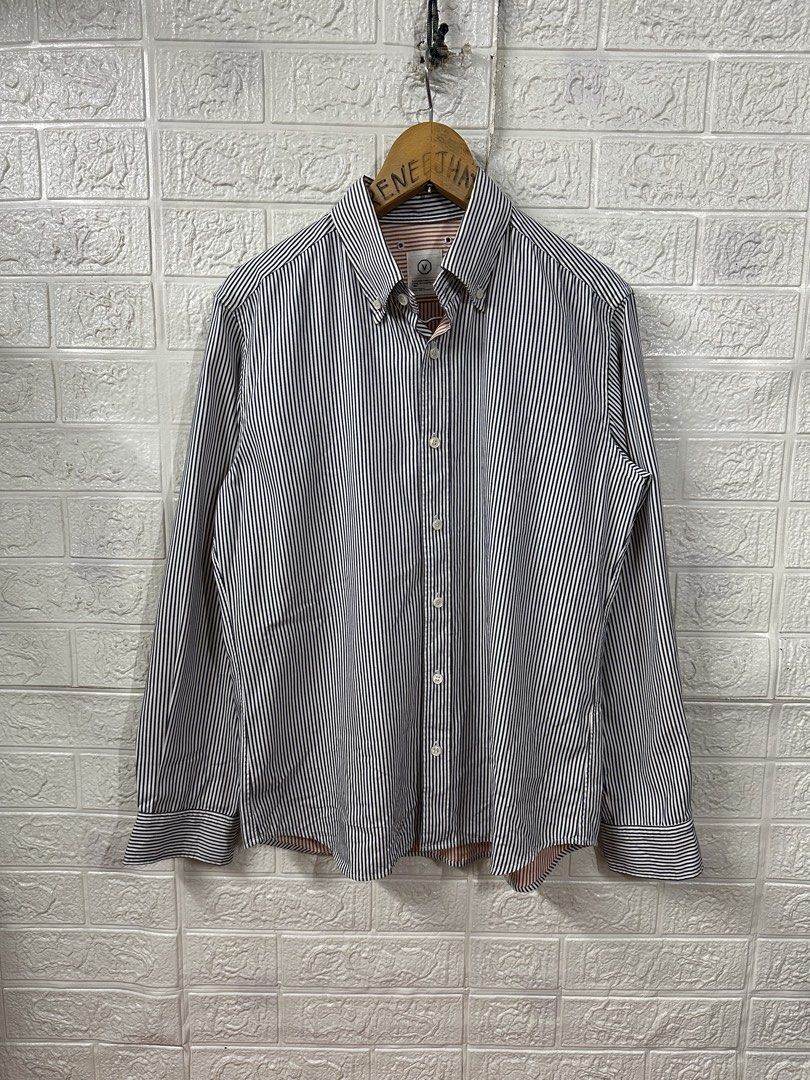 VISVIM Striped Cotton Button-Up Shirt (Category: Tshirts & Polo Shirts ) located in Bacoor. Submitted by reneejhay (Listing ID 1460158363, Image 1). Description: VISVIM button-up shirt. Classic navy and white stripes. The inner lining has a contrasting rust and white stripe pattern. Made in Japan. 100% cotton shell, deer skin strap. Great for smart casual wear..