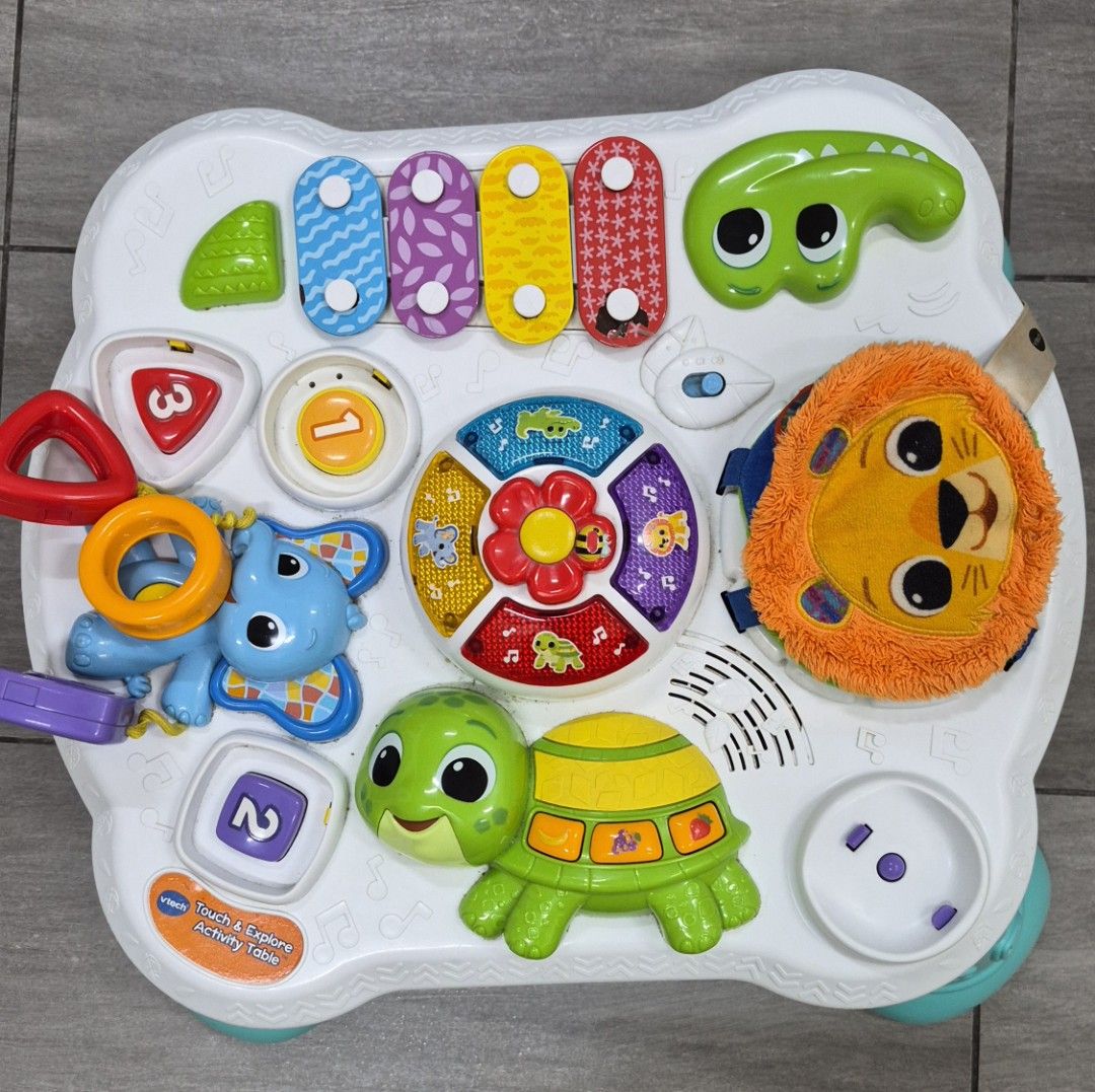 VTech Touch & Explore Activity Table (Category: Infant Playtime) located in Kuala Lumpur. Submitted by me_shopaholic_me (Listing ID 1460285762, Image 1). Description: +VTech Touch & Explore Activity Table +Packed with interactive buttons and toys - Features a xylophone, spinning toy, and animal characters +Great for playtime and exploration +Fully functional with some signs of wear and tear +our kids outgrown of this Activity toy.