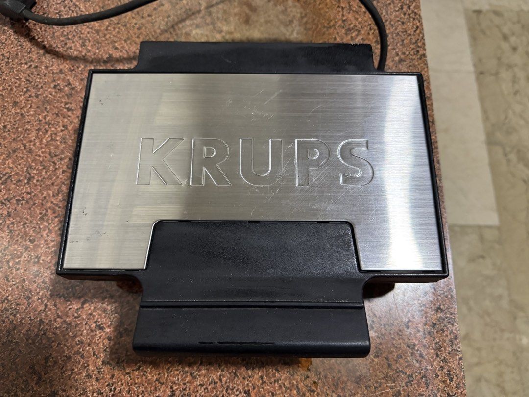 Waffle Maker (Category: Ovens & Toasters) located in Manila. Submitted by rnc.shop (Listing ID 1460246614, Image 2). Description: Krups Expert Waffle Maker (Type FDK2) Color: Black Material: Stainless Steel, Aluminum, PFAS Chemicals Wattage: 850 watts Voltage: 220V Item Weight: 3.1 kg (6.82 lbs) .