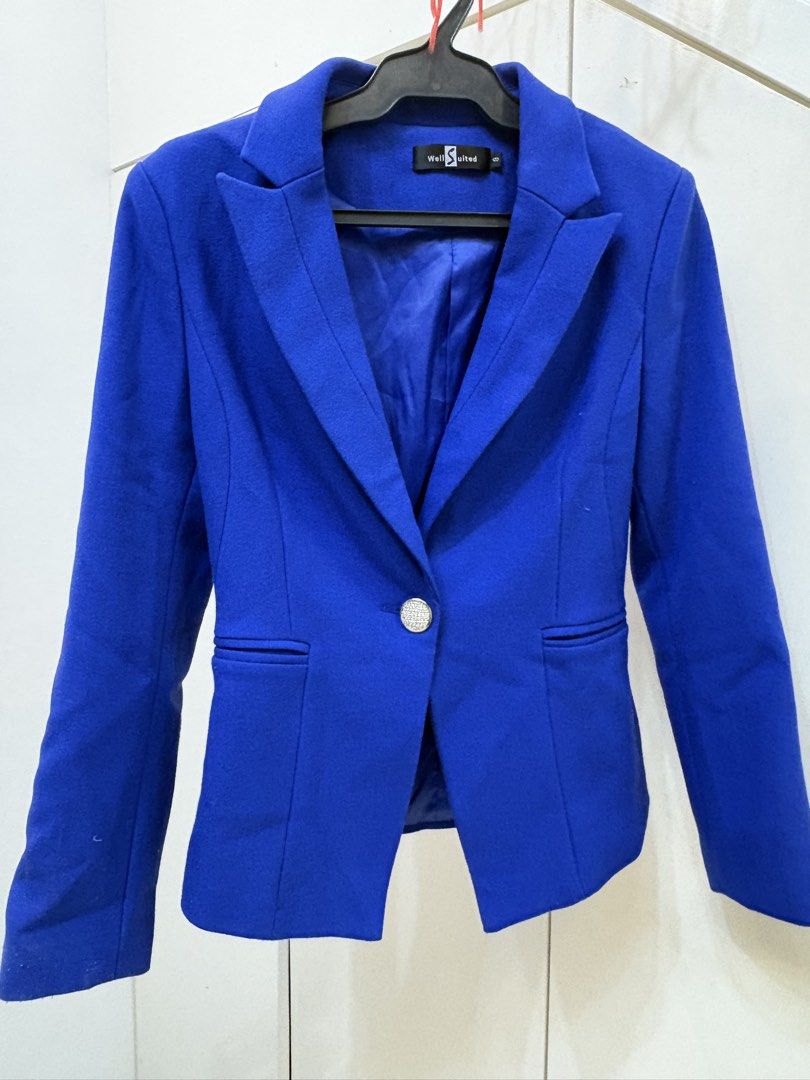 Well Suited Royal Blue Single Button Blazer (Category: Coats, Jackets and Outerwear) located in Paranaque City. Submitted by yanionlineshopping (Listing ID 1460230622, Image 1). Description: - Royal blue blazer from Well Suited - Single button closure at the front - Decorative button detail at the back waist - Lapel collar - Sharp and professional look - Ideal for work or smart casual occasions - Size S.