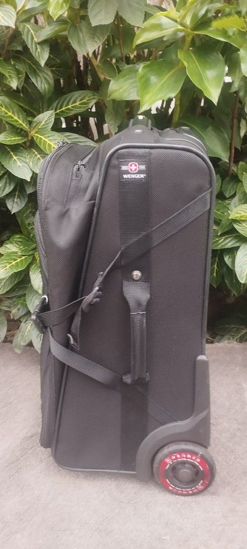 WENGER Swiss - Cabin Trolley (Category: Luggage) located in Manila. Submitted by benjie.benjie3 (Listing ID 1460147090, Image 2). Description: *WENGER Swiss - Cabin Trolley 20.5" - 2 Wheels - Matibay Pang-Travel* For Sale: Original Wenger Luggage (Japan Surplus) ✅ Original Wenger - Swiss Brand (Victorinox group) ✅ Size: H 20.5" x L 13.75" x W 8.75" - *Cabin / Hand Carry Size* pasok sa CebuPac & PAL ✅ 2 Wheels - Mas matibay at hindi madaling masir