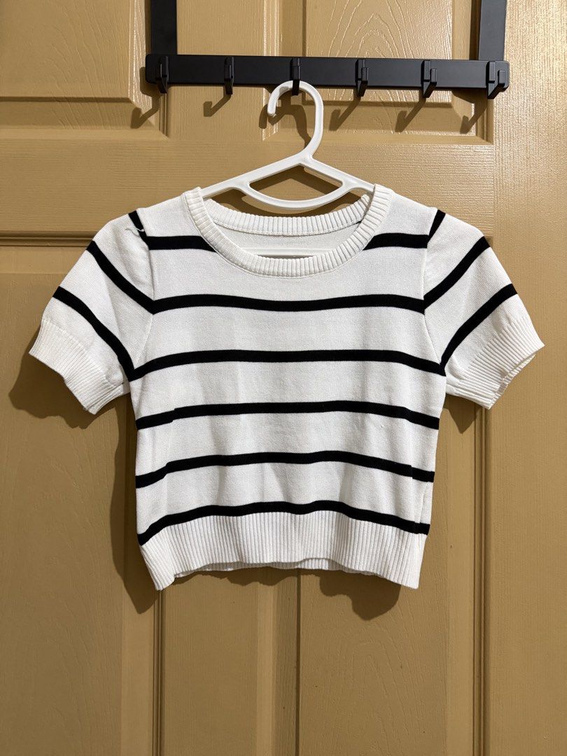 White and Black Striped Cropped Knit Top (Category: Blouses) located in Manila. Submitted by chavirly (Listing ID 1460190196, Image 1). Description: - Cute cropped knit top - White with black horizontal stripes - Short sleeves - Crew neckline - Ribbed hem and cuffs - Perfect with high-waisted bottoms - Easy to style for casual or dressed-up looks.