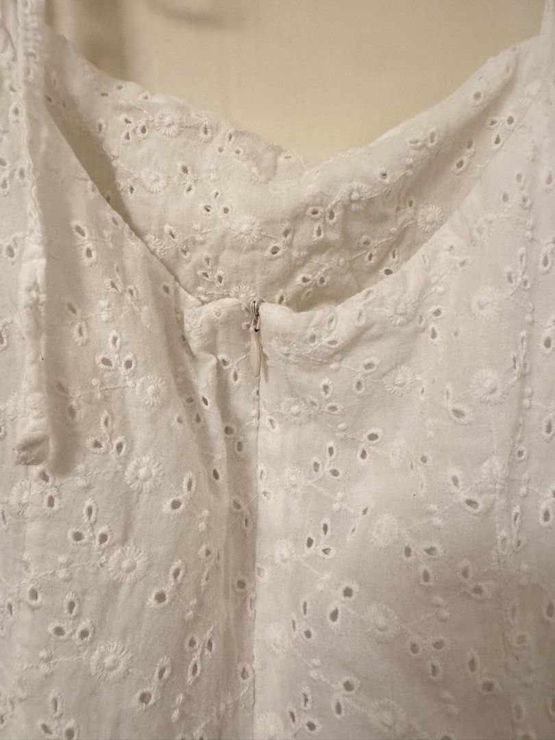 White Eyelet Mini Sundress with Self-Tie Straps (Category: Dresses) located in Bacoor. Submitted by ailujanitsirc (Listing ID 1460258795, Image 3). Description: ✧･ﾟ: *✧･ﾟ:* - Cute white eyelet mini sundress - Adjustable tie straps - Zipper closure at the back - Small stain on front near hem (refer to last photo for details) - Bought at STP Flea Market for ₱750 - RFS: Decluttering MOP: Gcash, BPI, and Maya Delivery: Lalamove, Grab Express, Gogo ex