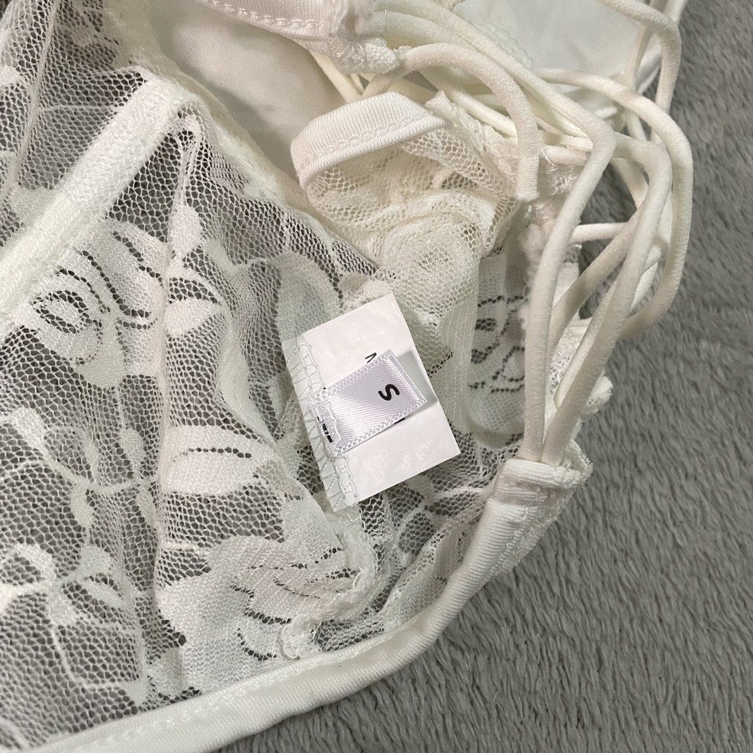 White Lace Corset Top with Back Lacing (Category: Others Tops) located in Taguig. Submitted by shopgrocer (Listing ID 1460155038, Image 3). Description: Fits xs-small Approx. 34 bust.