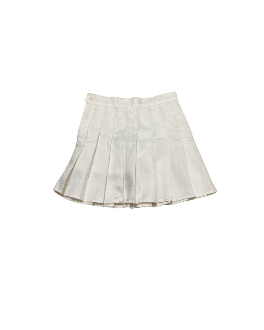 White Pleated Mini Skirt (Category: Skirts) located in Manila. Submitted by skylurker.star (Listing ID 1460160319, Image 1). Description: - Classic white pleated mini skirt - Versatile for dressing up or down - Side button closure - Ideal for school or casual wear.