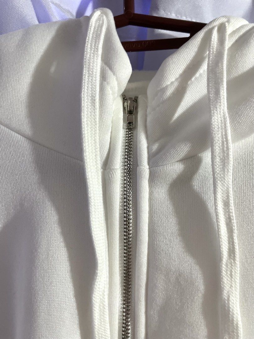 White Zip-Up Hoodie - Large (Category: Hoodies) located in Manila. Submitted by sophie.navs (Listing ID 1460200840, Image 2). Description: WHITE ZIP-UP HOODIE — ₱280 ONLY * Condition: Like new, used once only * Freshly washed and ready to wear * Stretchable fabric * Original price: ₱600+ * Bought on sale for: ₱400 * Selling for: ₱280 only! * RFS: Not a fan of the fabric/material 📌 No flaws or damage. Only used once and freshly washed. ✨ Perfect 