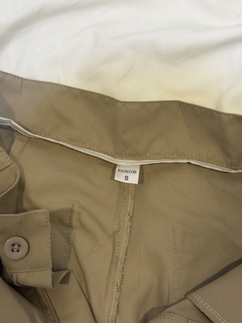 Wide Leg Pants Size S Beige (Category: Other Bottoms) located in Mandaluyong City. Submitted by closet.me (Listing ID 1460237042, Image 3). Description: - Beige wide leg pants - Size S - Button and zip closure - Front and back pockets - Versatile for casual or dressed-up outfits - Comfortable fit.