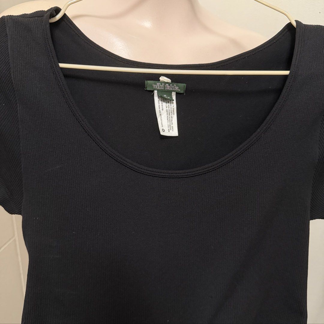 WILD FABLE Black Activewear Top [M] (Category: Activewear) located in Malabon City. Submitted by k_intimates (Listing ID 1460295476, Image 3). Description: Details: • Size M (can fit also to small) • Like new! • Solid black rib knit active top..