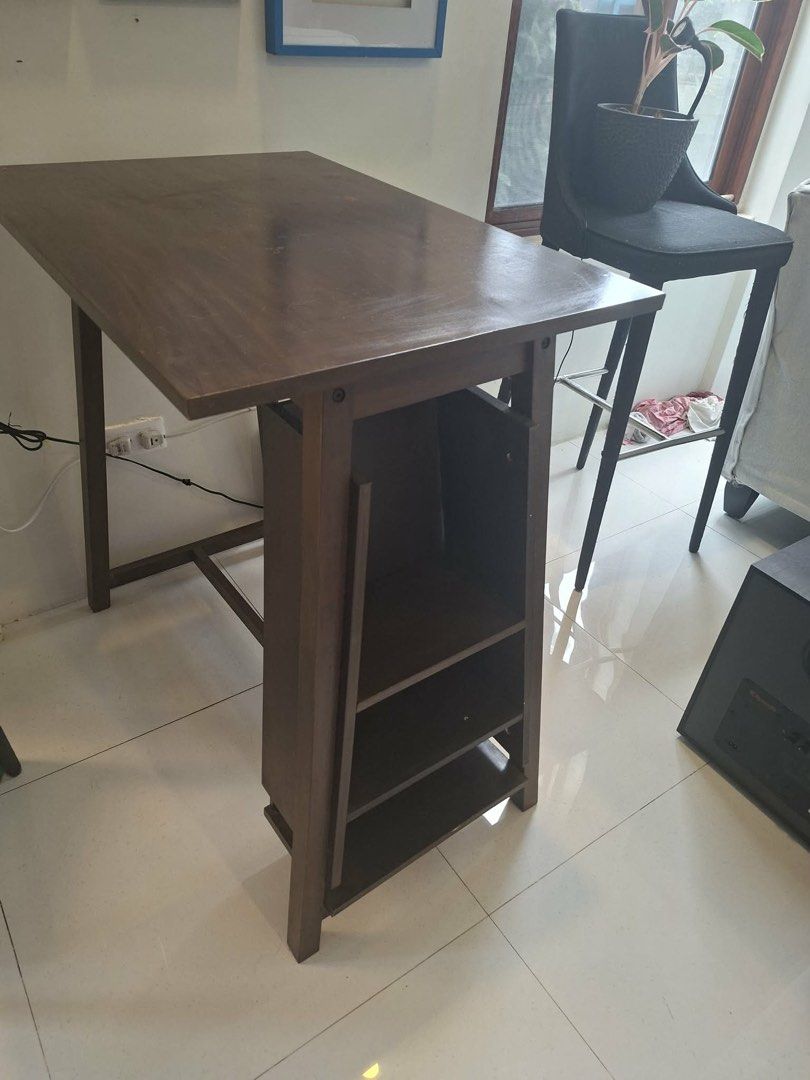 Wooden Bar Table with Shelves (Category: Tables & Sets) located in Mandaluyong City. Submitted by taag_ (Listing ID 1460186670, Image 3). Description: - 80L x 57W x 87H inches - Built-in shelves - Top surface has minor marks Negotiable! PM for more info. Pick up is in Silang, Cavite :).