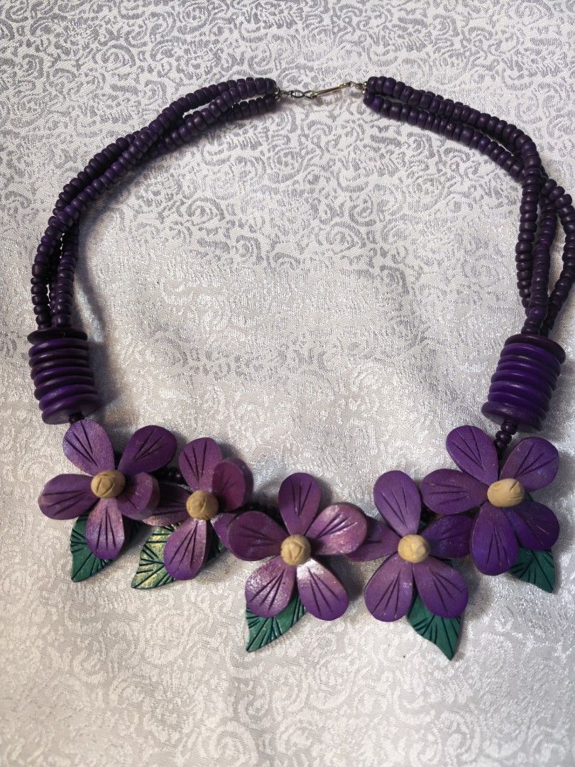 Wooden flower necklace pretty (Category: Necklaces) located in Tuguegarao City. Submitted by zenphoenix-7ad615 (Listing ID 1460145843, Image 2). Description: Wooden necklace in purple color.