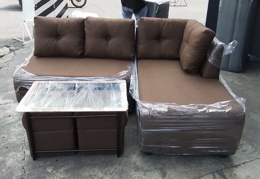 Xander L-type Sofa (Category: Chairs) located in Tayabas. Submitted by lovelyalcaraz (Listing ID 1460288074, Image 3). Description: Xander L-type Sofa ( high-end ) with pillows & stool w center table ......Uratex class A & good lumber inside....Leather Dimension 2s L42.5" x W28" x H31" Lounge L52" x W28" x H31" Center Table L31" x W21" H17" Stool L14.5" x W13.5" x H14.5".