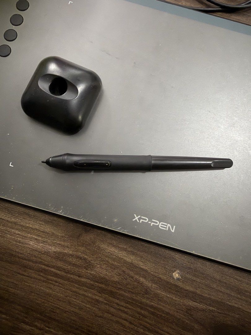 XP-PEN Deco 01 Beginner Drawing Tablet (Category: Other Accessories) located in Quezon City. Submitted by jianmorata89759 (Listing ID 1460117069, Image 2). Description: RFS: Decluttering Used this to write digitally for school, now using an ipad. Fully functional with type c to usb a cord, pen, extra nibs for pen, and pen stand. Can also be used for gaming as long as configured properly. Great for those who want to start digital art! Price is neg