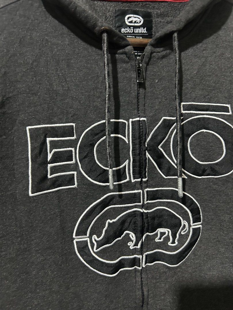 Y2K Ecko Sip up hoodie (Category: Coats, Jackets and Outerwear) located in Santa Rosa. Submitted by unexpected.finds4026 (Listing ID 1460176187, Image 2). Description: M on tag 22 W 28 L Best fit to M - Semi L 9.5/10 condition 9.5/10 color rate complete tags no flaws .