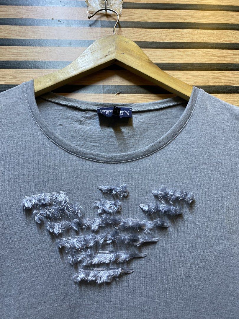y2k Emporio Armani jeans (Category: Shirts) located in Makati City. Submitted by drip.poww (Listing ID 1460219165, Image 3). Description: - Authentic Emporio Armani - Color: Gray - Size: Small - Dimes: 19x26 - Authentic - Excellent condition - Need wash, fresh from bale - Material: 100% Cotton Please don’t expect too much—these are thrifted (ukay) items. 😊 !!STILL NEGOTIABLE!!.