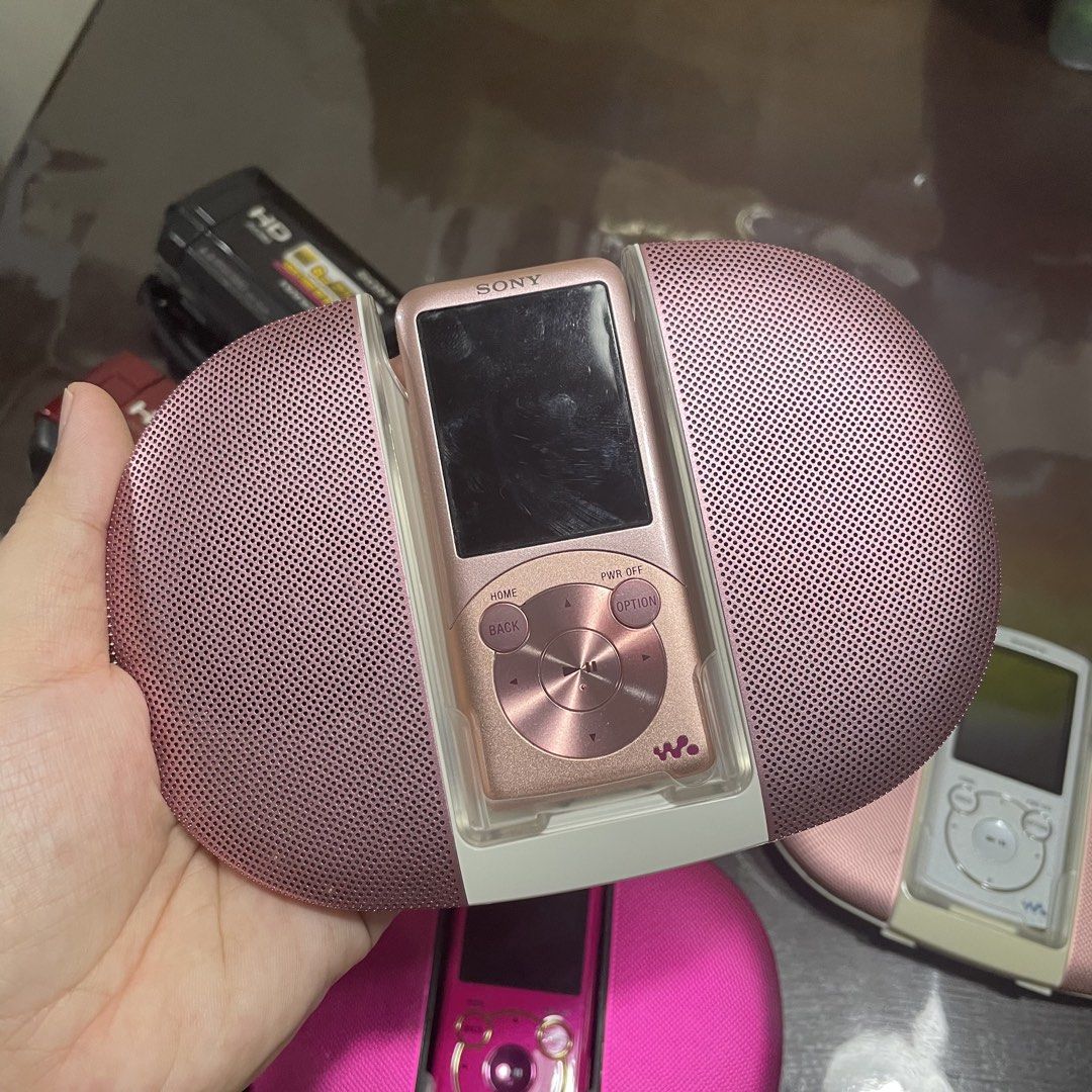 Y2K Sony Walkman with Speaker (Category: Portable Music Players) located in Santo Tomas. Submitted by classicshots22 (Listing ID 1460193585, Image 3). Description: 2399 per set In default Japanese language (di napapalitan ng english) Need naka-dock sa speaker para magamit (old models so nagdegrade na batteries,best use lang to sa bahay) Inclusions: Charging/Speaker dock Cord Unit itself Sync cable for laptop.