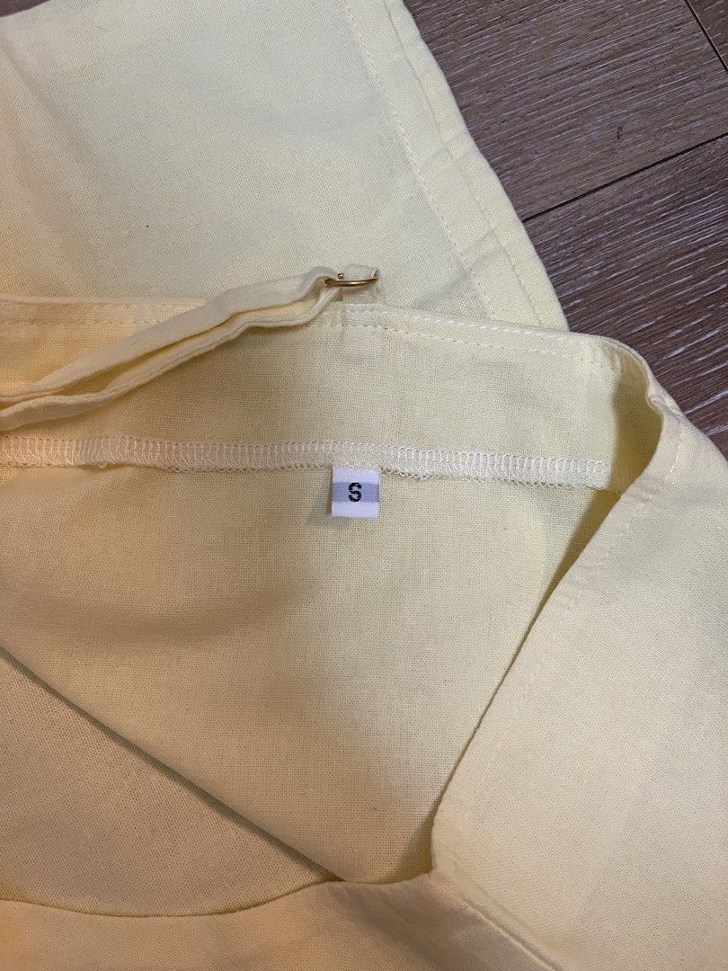 Yellow Linen Cami Top Size S (Category: Sleeveless) located in Pasig City. Submitted by d_cluttered (Listing ID 1460242749, Image 3). Description: - Cute yellow cami top - Spaghetti straps with tie detail at the back - Versatile for layering or wearing on its own - Simple and easy to style.
