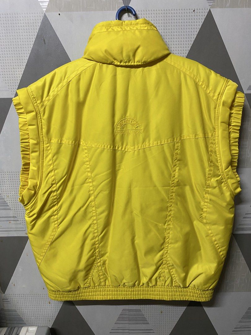 Yellow Puffer Vest with Collar (Category: Coats, Jackets and Outerwear) located in Quezon City. Submitted by natesm (Listing ID 1460208321, Image 2). Description: Exploration puffer vest free size never used Length: 32cm Width: 23cm.