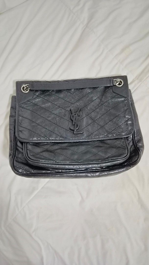 YSL Niki Medium (Category: Luxury Bags & Wallets) located in Manila. Submitted by declutterwithme__ (Listing ID 1460209265, Image 2). Description: Ysl Niki Medium can fit macbook 13 inches like new condition with dustbag with authentication P100,000.