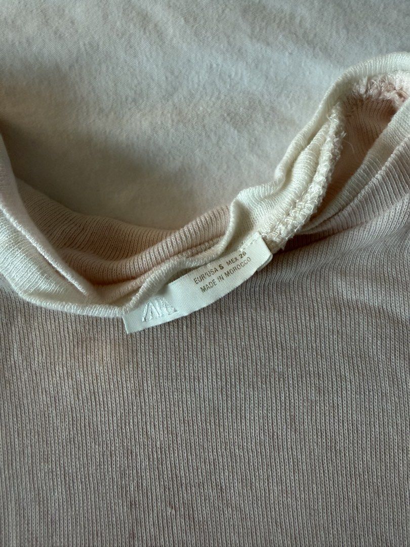Zara Layered Tank Top (Category: Sleeveless) located in Angeles City. Submitted by aicl_ (Listing ID 1460129798, Image 2). Description: - Cute pink ribbed tank top from Zara - Sleeveless design.