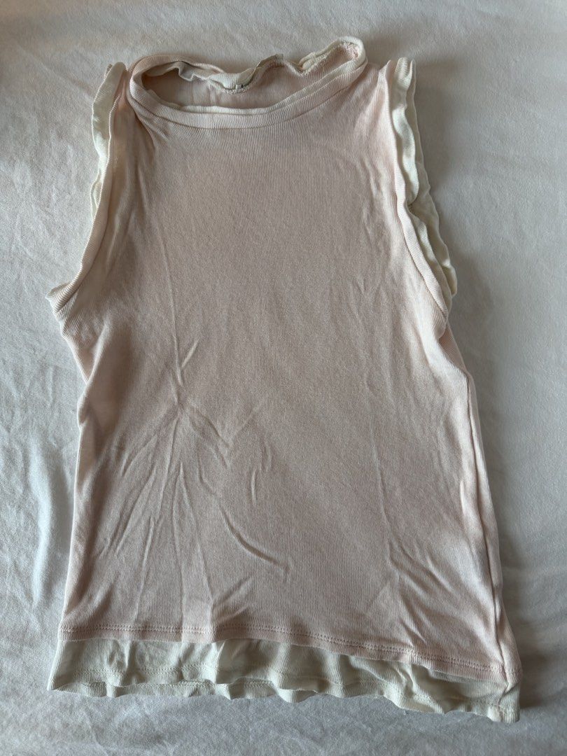 Zara Layered Tank Top (Category: Sleeveless) located in Angeles City. Submitted by aicl_ (Listing ID 1460129798, Image 1). Description: - Cute pink ribbed tank top from Zara - Sleeveless design.