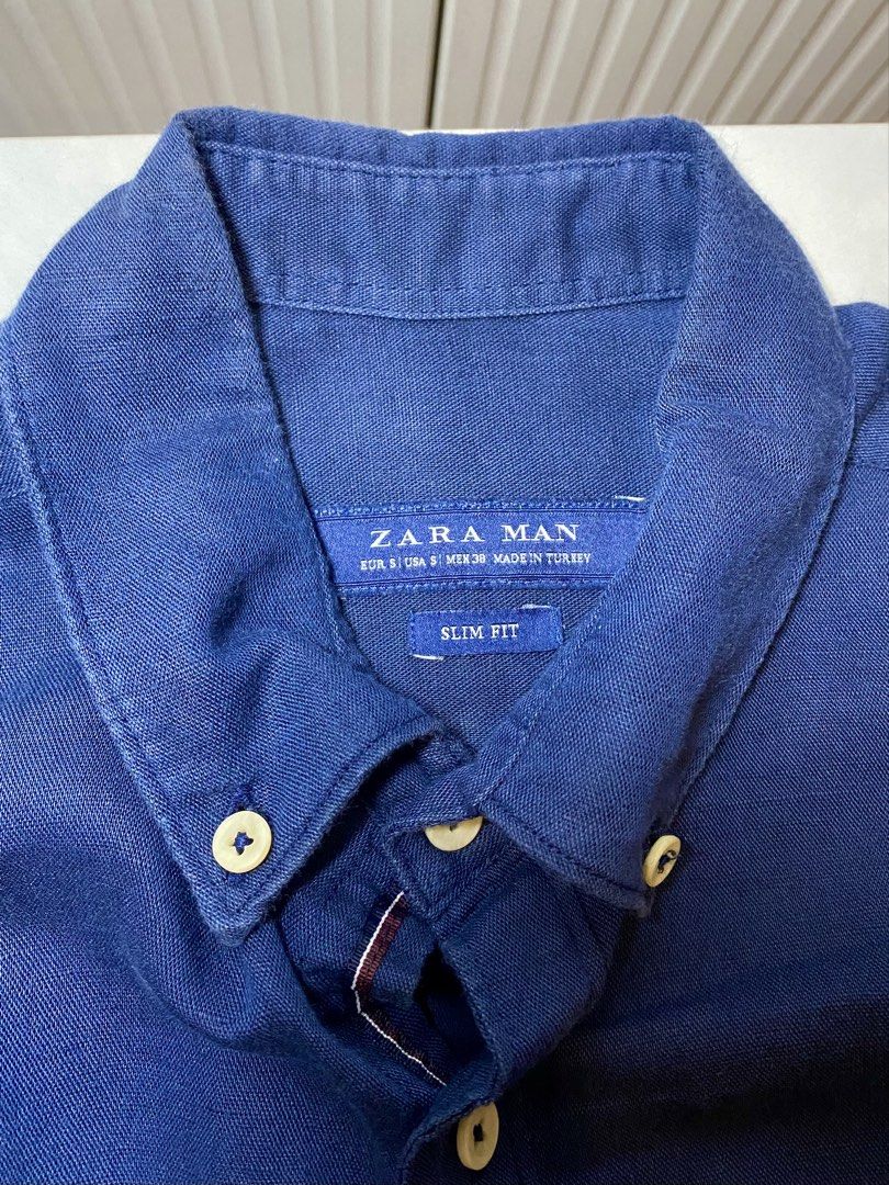 Zara Man Slim Fit Blue Button Down Shirt Size S (Category: Tshirts & Polo Shirts ) located in Manila. Submitted by sebthrift (Listing ID 1460129754, Image 3). Description: - Zara Man Blue Button-Down Shirt - Slim Fit Style - Classic Collar with Button-Down Detail - Made in Turkey - Versatile for Casual or Smart-Casual Wear - Easily Pairs with Jeans or Trousers.