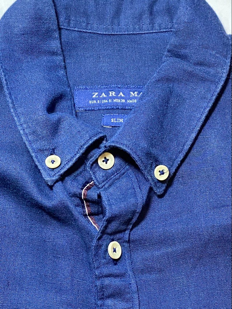 Zara Man Slim Fit Blue Button Down Shirt Size S (Category: Tshirts & Polo Shirts ) located in Manila. Submitted by sebthrift (Listing ID 1460129754, Image 2). Description: - Zara Man Blue Button-Down Shirt - Slim Fit Style - Classic Collar with Button-Down Detail - Made in Turkey - Versatile for Casual or Smart-Casual Wear - Easily Pairs with Jeans or Trousers.