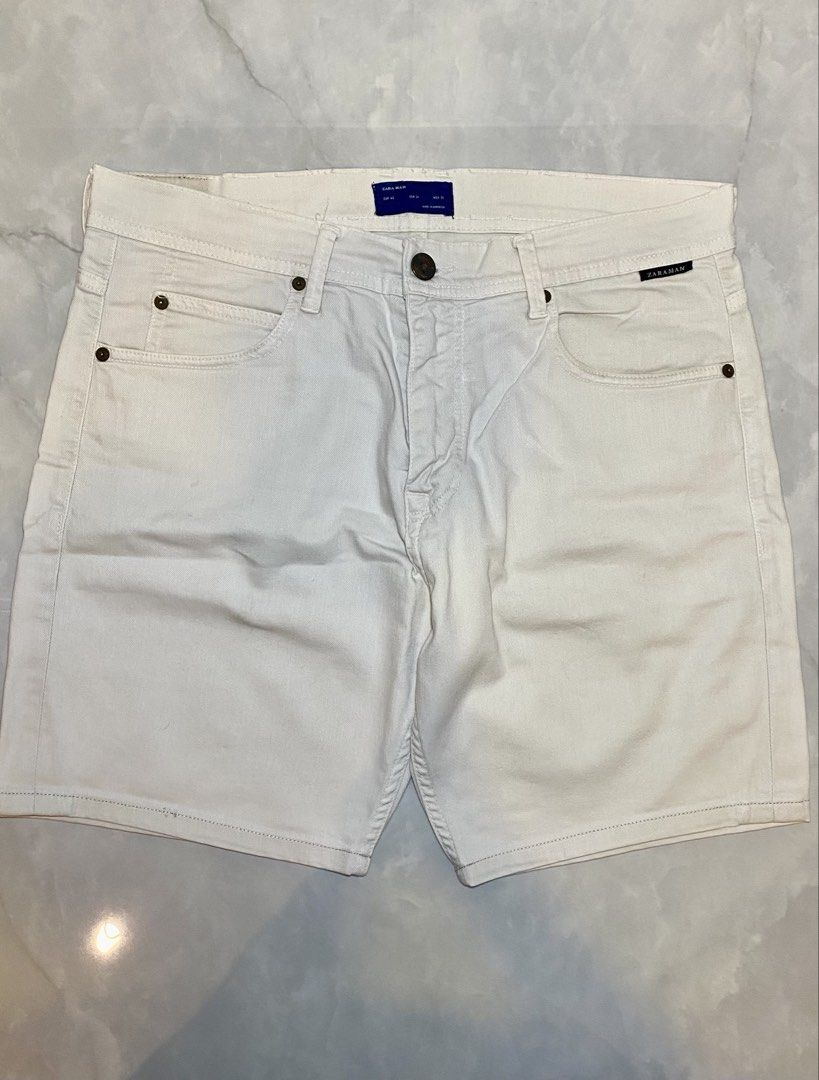 Zara Man White Denim Shorts Size 31 (Category: Shorts) located in Manila. Submitted by sebthrift (Listing ID 1460129803, Image 1). Description: - Zara Man White Denim Shorts - Size: 31 - Made in Morocco - Classic five-pocket design - Button and zip fly closure - Ideal for everyday casual wear.