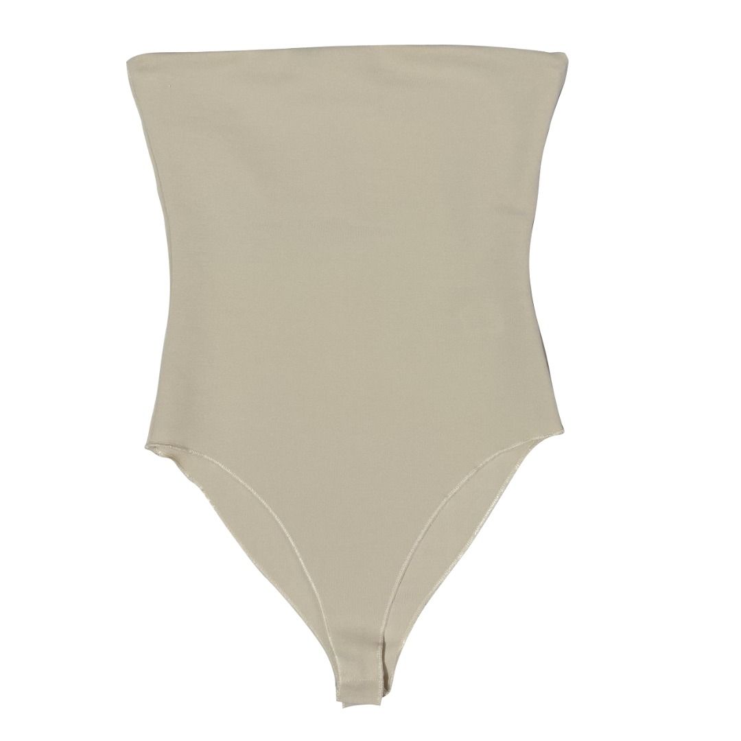 Zara Stretch Bandeau Bodysuit (Category: Others Tops) located in Dasmarinas. Submitted by kiyanah (Listing ID 1460161495, Image 1). Description: - strapless/tube. bandeau bosyuit in oyster white/cream - worn twice only - stretchable material (super good quality!) RFS: no plans of wearing it anymore; decluttering Measurement: Total length (top to bottom of the snapped crotch) - 21 inches Chest width - 13 inches Waist width: 12 inches.