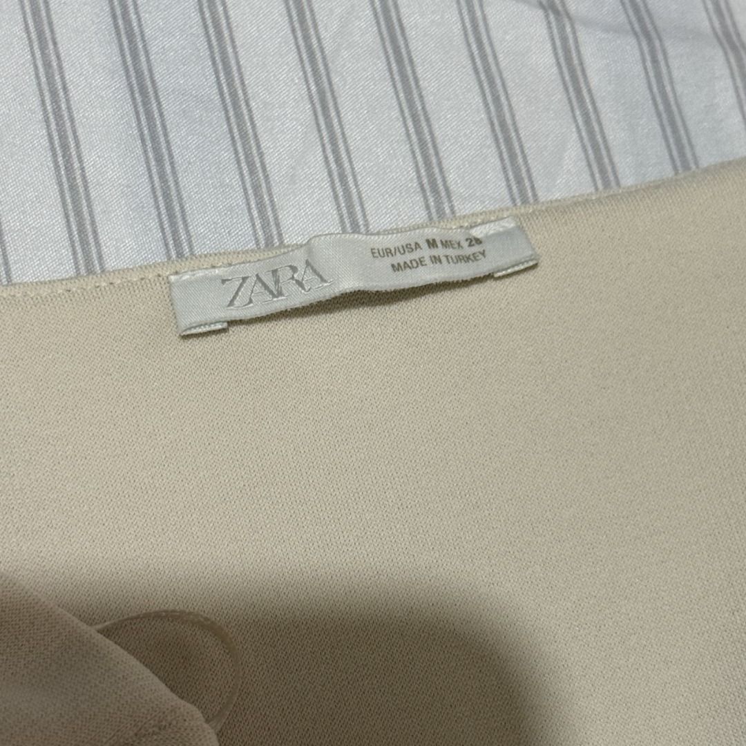 Zara Stretch Bandeau Bodysuit (Category: Others Tops) located in Dasmarinas. Submitted by kiyanah (Listing ID 1460161495, Image 2). Description: - strapless/tube. bandeau bosyuit in oyster white/cream - worn twice only - stretchable material (super good quality!) RFS: no plans of wearing it anymore; decluttering Measurement: Total length (top to bottom of the snapped crotch) - 21 inches Chest width - 13 inches Waist width: 12 inches.