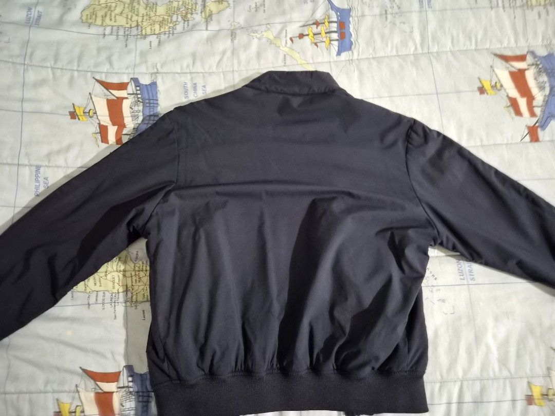 ZARA Traveler Bomber Jacket Navy Blue (Category: Coats, Jackets and Outerwear) located in Mandaluyong City. Submitted by countyannis-13843 (Listing ID 1460266440, Image 2). Description: - Zara Navy Blue Bomber Jacket - From the Traveler Collection - Zip-up front with a stand collar - Ribbed cuffs and hem for a snug fit - Two convenient side pockets - Fully lined interior - Ideal for layering over outfits.