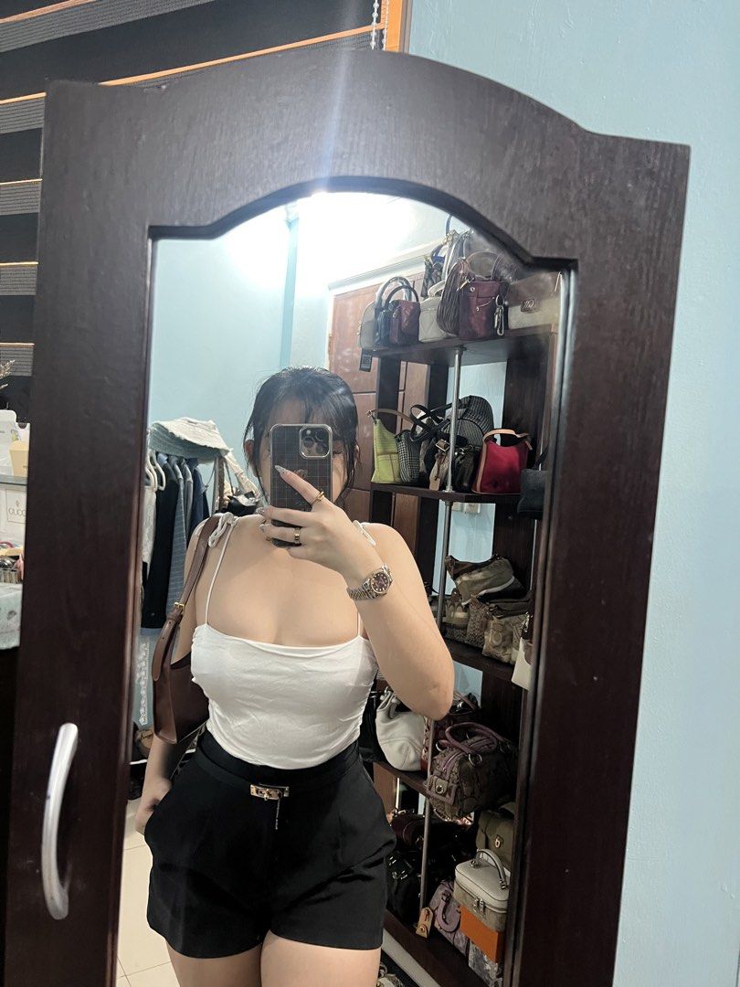 Zara White Ruched Tie Strap Crop Top (Category: Sleeveless) located in Manila. Submitted by camieday04 (Listing ID 1460150107, Image 3). Description: - Zara white ruched crop top - Features tie straps - Gathered bust detail - Perfect for pairing with high-waisted bottoms - Ideal for night outs or casual day looks - Comfortable and stylish.