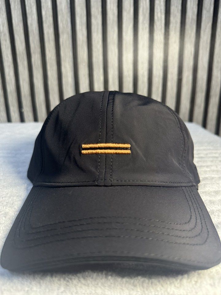 Zegna Black Baseball Cap with Logo (Category: Caps & Hats) located in Manila. Submitted by aoparaiso (Listing ID 1460261143, Image 1). Description: - Classic black Zegna cap - Features embroidered Zegna logo on the side - Elasticated back for a comfortable fit - Simple and versatile design - Ideal for everyday wear.