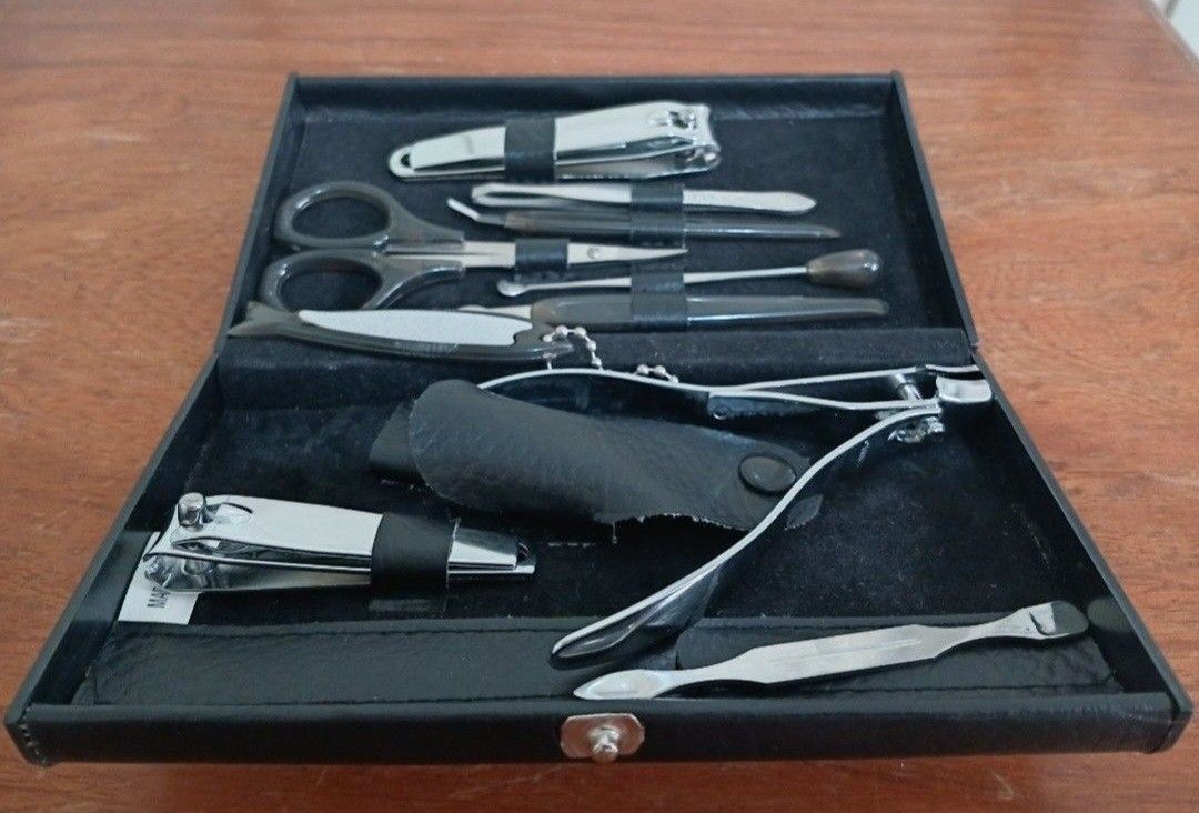 10-Piece Manicure & Pedicure Set With Case (Category: Hands & Nails) located in Bulacan. Submitted by honhonliz (Listing ID 1460354782, Image 3). Description: Only scissor & tweezer have stainless steel markings This personal grooming kit includes essential stainless steel tools securely organized inside a compact faux-leather travel case. Key tools include multiple sizes of nail clippers, a cuticle nipper, grooming scissors, tweezers, a nail fil