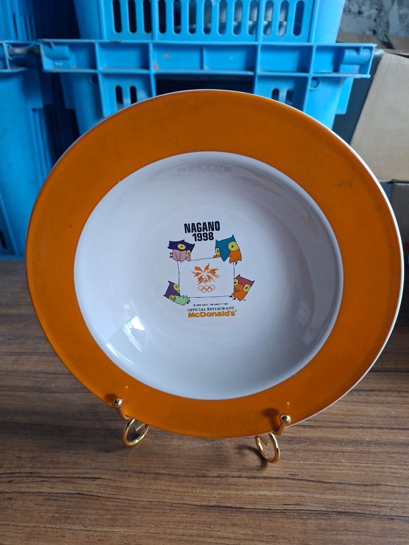 1998 Nagano Winter Olympics Ceramic Bowl (Category: Other Kitchenware & Tableware) located in Consolacion. Submitted by luxekerei (Listing ID 1460374622, Image 3). Description: - vintage 1998 Nagano Winter Olympics commemorative ceramic plate featuring an orange rim and a McDonald's official restaurant logo in the center..
