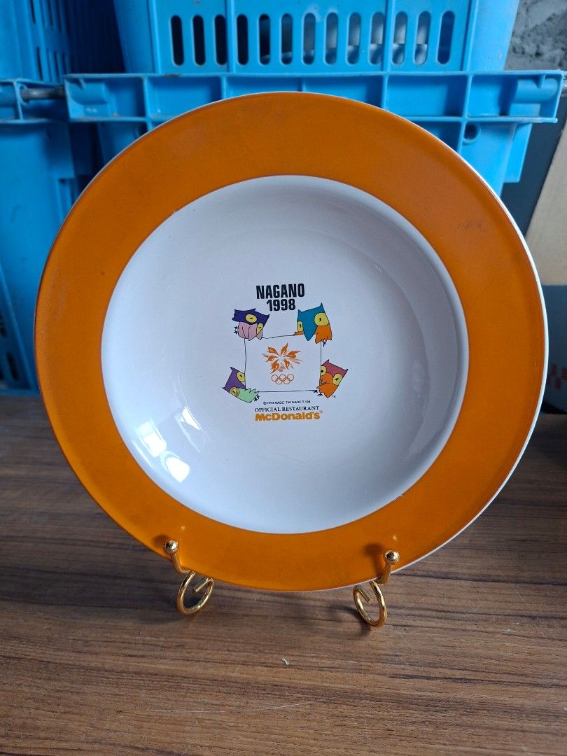 1998 Nagano Winter Olympics Ceramic Bowl (Category: Other Kitchenware & Tableware) located in Consolacion. Submitted by luxekerei (Listing ID 1460374622, Image 1). Description: - vintage 1998 Nagano Winter Olympics commemorative ceramic plate featuring an orange rim and a McDonald's official restaurant logo in the center..