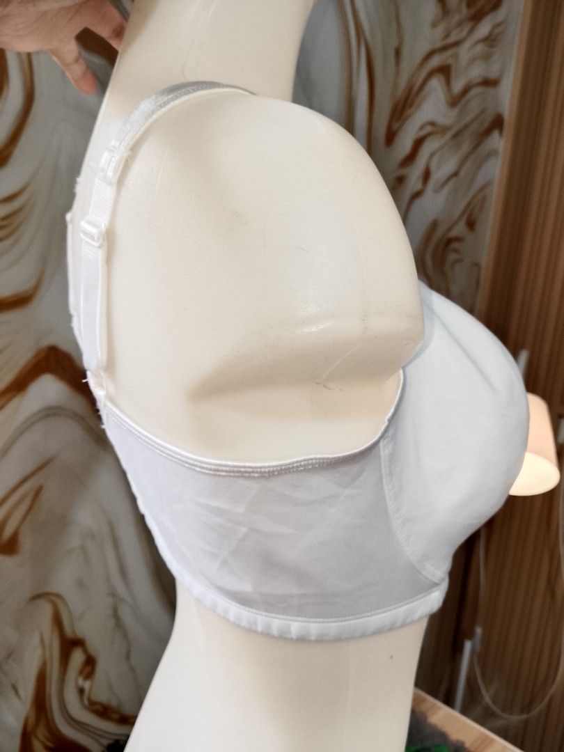 30dd Playtex White Full Coverage Bra not padded nonwire (Category: Undergarments & Loungewear) located in Manila. Submitted by truecrystal-1407 (Listing ID 1460360926, Image 2). Description: - Full coverage white bra for everyday comfort. - Elegant mesh detail on upper cups and center gore. - Adjustable straps for a personalized fit. - Secure multi-hook closure at the back. - Made with smooth, comfortable fabric..