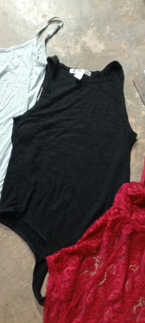 3 Bodysuits: Black, Grey, Red Lace (Category: Others Tops) located in Manila. Submitted by ezekislacl02490 (Listing ID 1460431541, Image 3). Description: - Bundle of 3 bodysuits - Includes: black ribbed sleeveless, grey spaghetti strap, and red lace detailed - Versatile for layering or wearing on their own - Mix and match for various looks - All are comfortable and stretchy.
