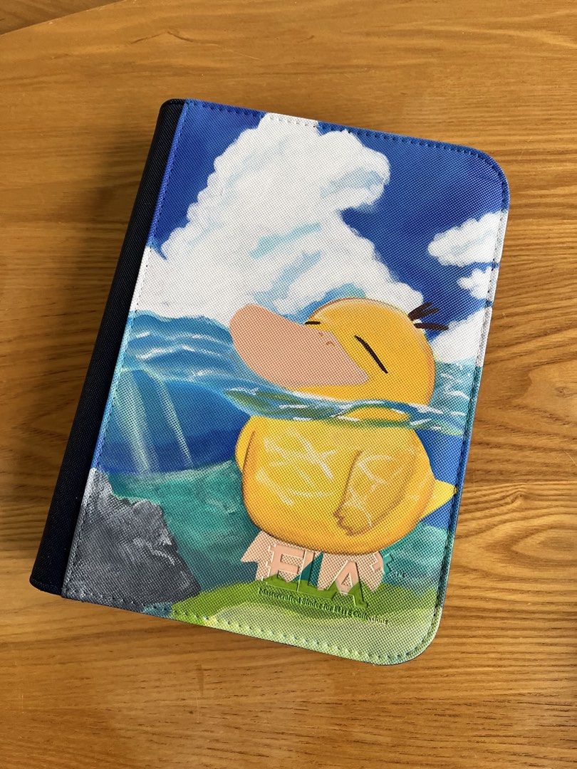 4-pocket Pokemon Psyduck Custom Painted Binder (Category: Other Stationery & Craft) located in Davao. Submitted by sayiestudios (Listing ID 1460503754, Image 1). Description: - Adorable Psyduck TCG binder - Features a vibrant illustration of Psyduck swimming - Solid blue back - Ideal for storing small items (cards, accessories, etc.) - Keeps belongings organized in style - A must-have for any Pokemon fan - ELA BRAND.