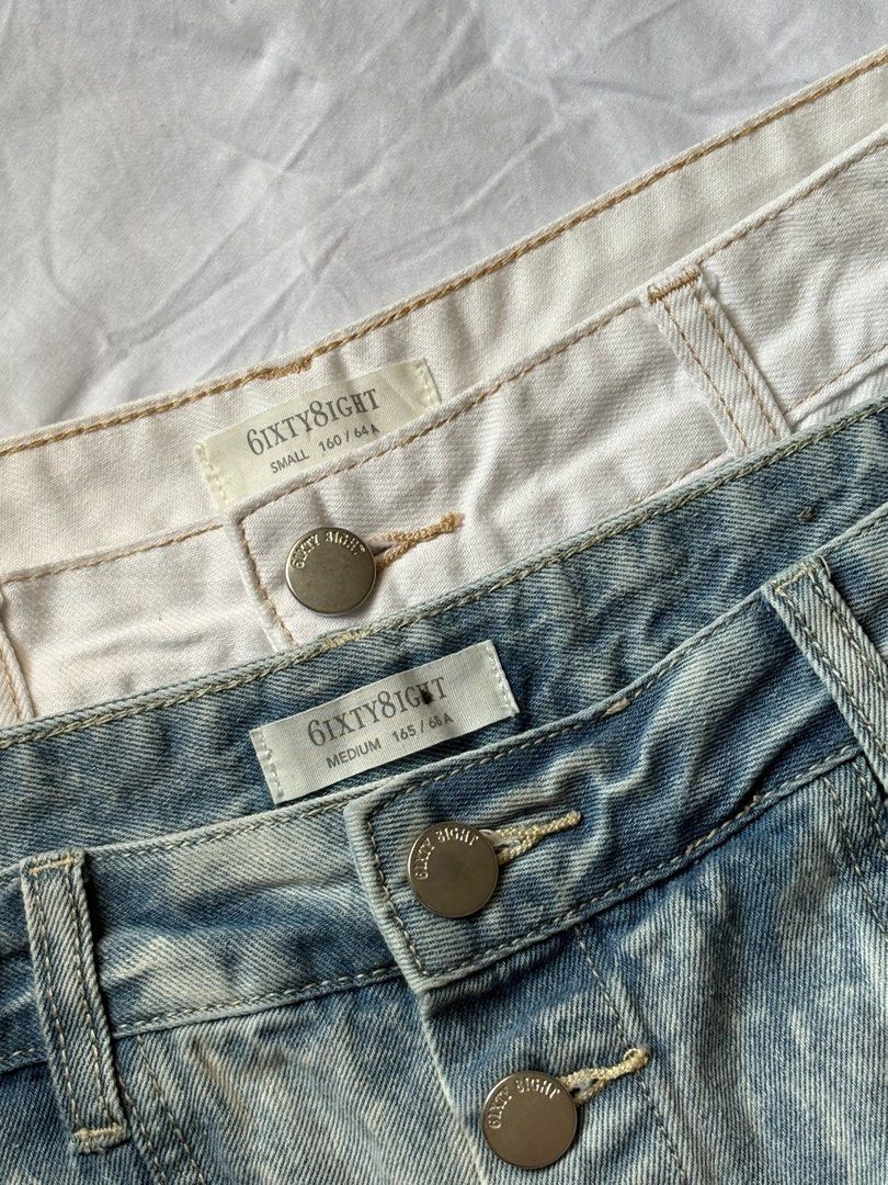 6ixty8ight Denim Skirts - Light Wash & Cream (Category: Skirts) located in Pasay City. Submitted by nicoletlntn_ (Listing ID 1460482098, Image 3). Description: - Bundle of two 6ixty8ight denim skirts - Light wash blue skirt with distressed raw hem - Cream/off-white skirt with raw hem - Both feature button-up fronts and classic pocket details - Ideal for creating stylish casual outfits.